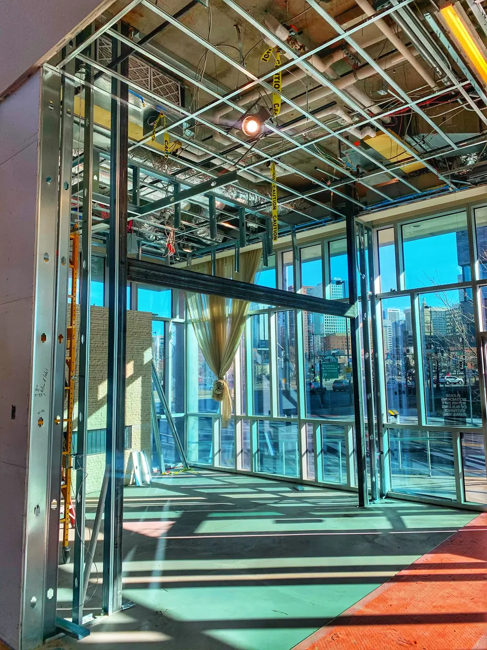 Steel framing installed around a commercial glass storefront